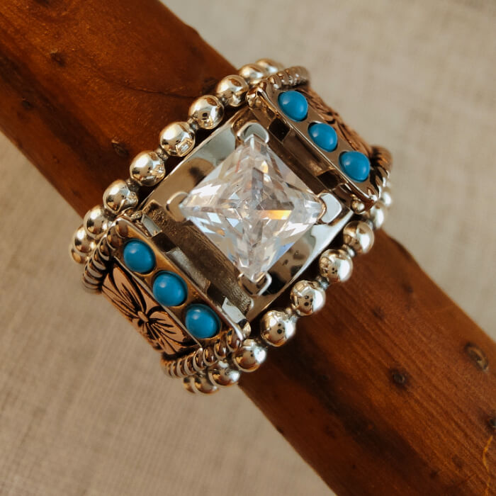 Square diamond ring set with turquoise accents and floral engravings
