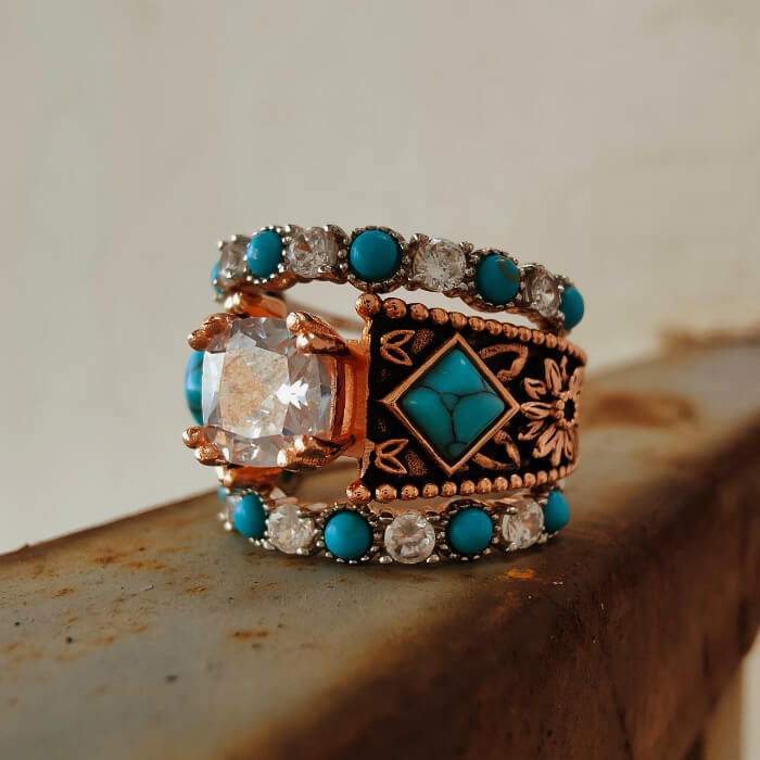 Rose gold floral engraved ring with turquoise and diamond accents
