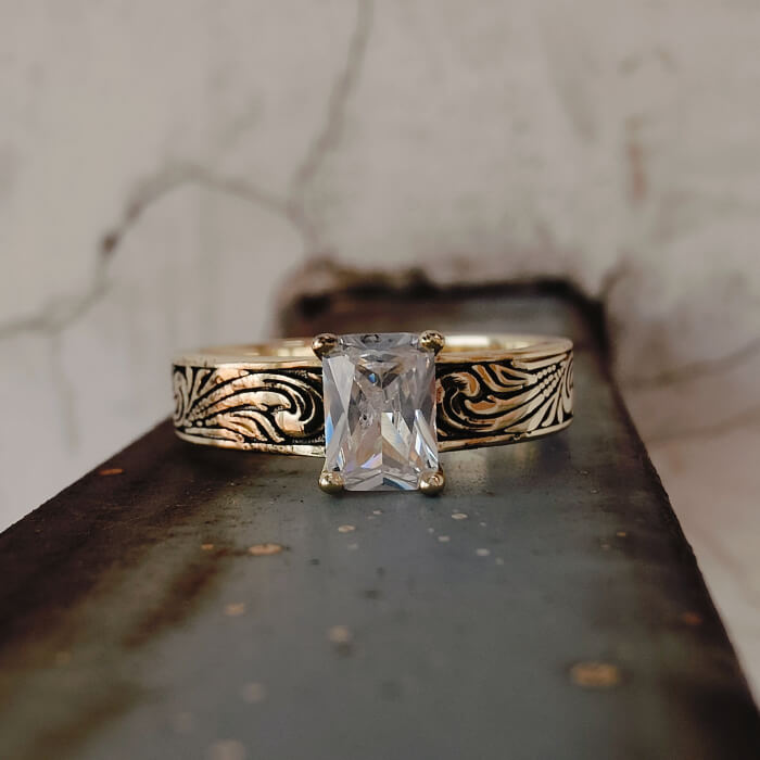 Elegant 14K gold ring with rectangular zircon and intricate floral engraving