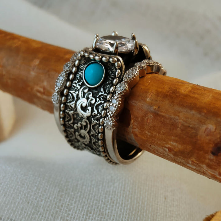 Handcrafted turquoise and diamond flower ring with intricate wave engravings