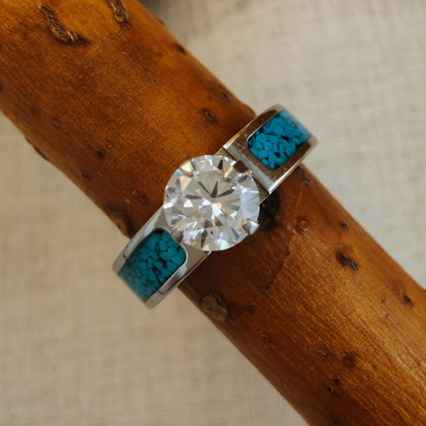 Steel wedding ring with zircon and blue crush turquoise accents.