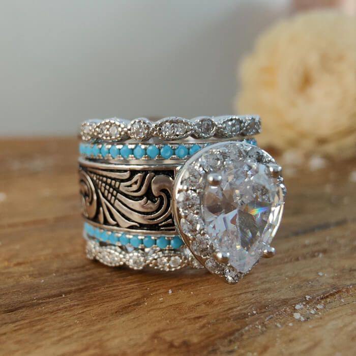Turquoise and diamond five-piece wedding ring set with heart-shaped center stone