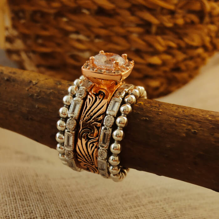 Rose gold western wedding ring set with engraved band and silver accents
