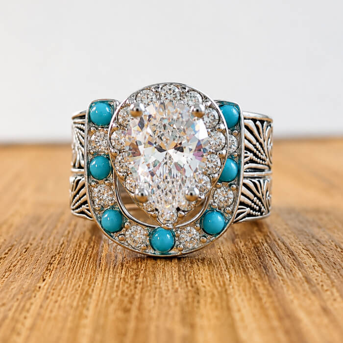 Pear cut turquoise and crystal western ring set in sterling silver