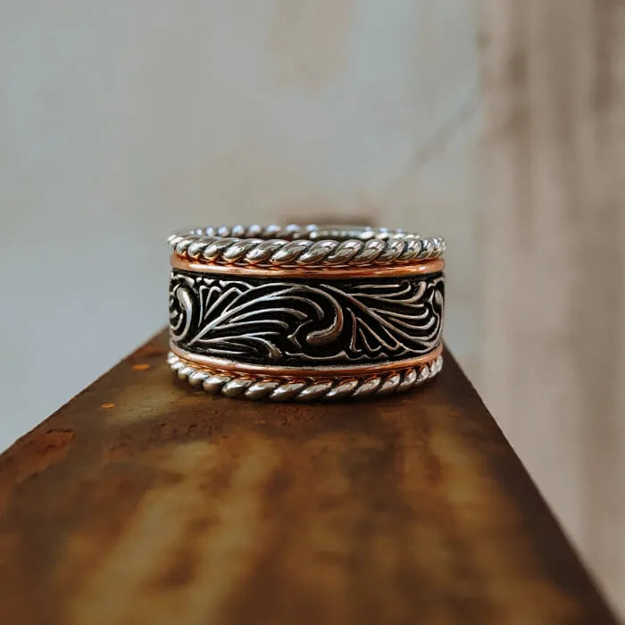 Front view of the engraved Western center band with two twist-style companion bands