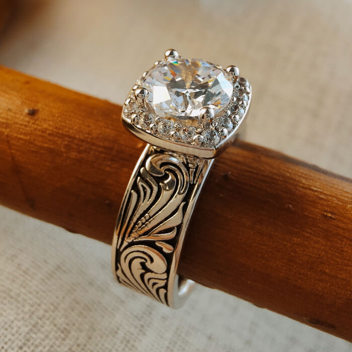 7mm zircon engagement ring with ornate silver band and diamond halo sparkle