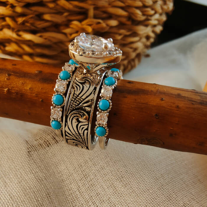 Vintage 3-piece wedding ring set with turquoise stones and intricate floral design.