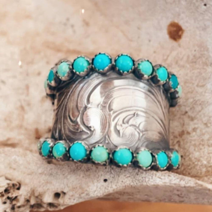 Engraved wide band ring adorned with turquoise stones for women