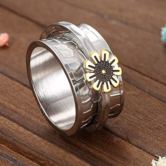 Steel sunflower hive band ring with gold accent