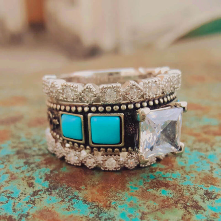 Vintage sterling silver turquoise and zircon ring set with intricate detailing