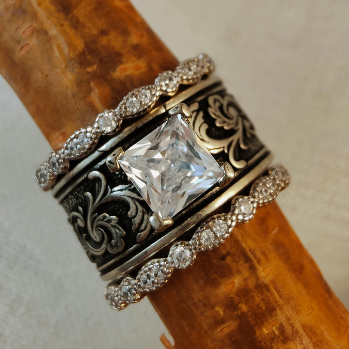 Sterling silver Western wedding ring set with cubic zirconia and floral design