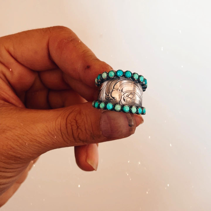 Wide band ring with turquoise stones and intricate engravings for women